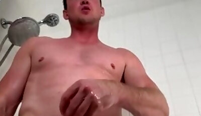 Amateur handsome hairy hunk jerks cock in the bathtub