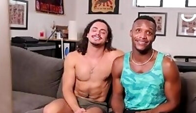 Long haired man interracial anal fucked on the sofa