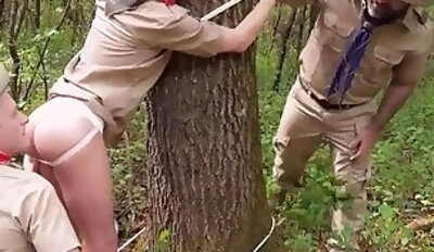 Scout plays with a twink while being tied in a tree