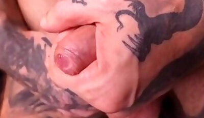 Close-up foreskin fondling on big flaccid uncut dick
