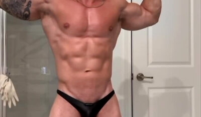 Muscle Hunk Reveals His Monster Cock